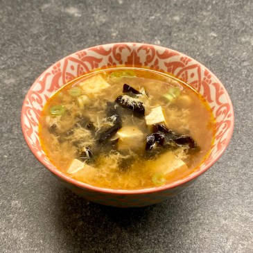 Hot and Sour Soup ©cadwu with wood ear mushrooms, ginger, chili paste, tofu and rice vinegar. Also ribbons of egg