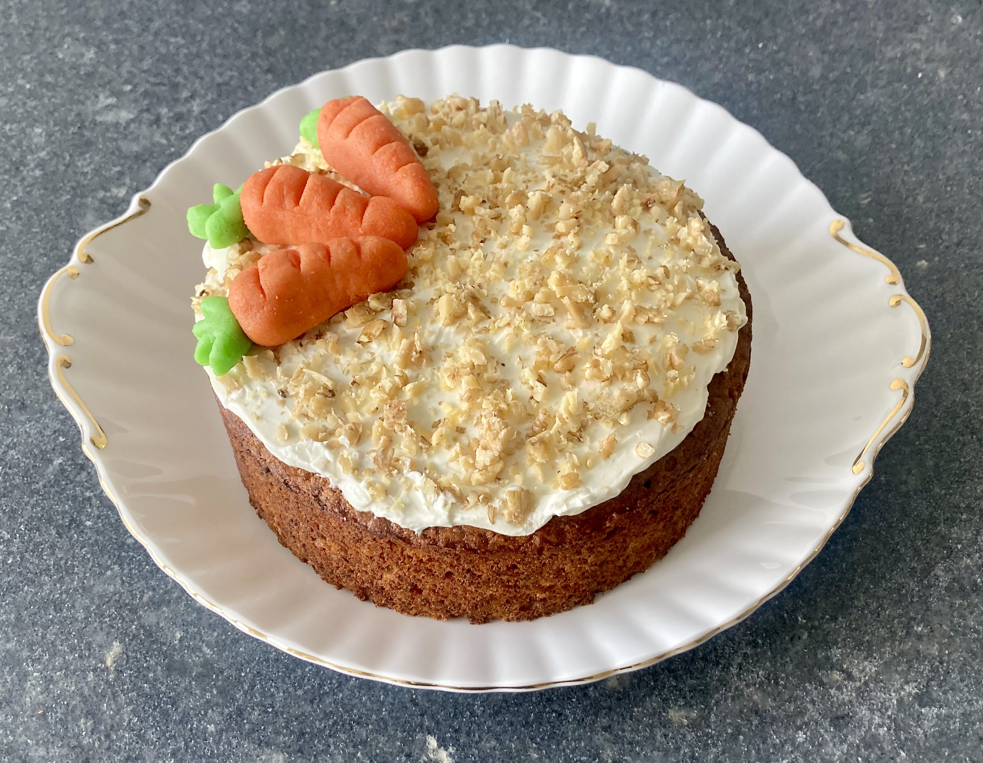 Carrot Cake ©cadwu made with almonds, walnuts, white raisins, organic eggs and grated carrot, topped with soft cheese with honey and lemon juice