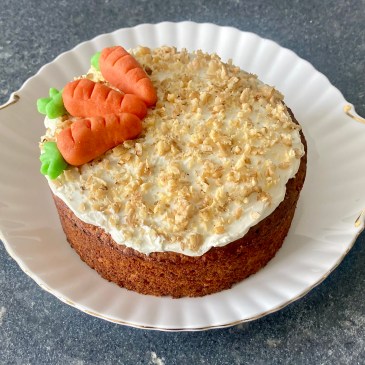 Carrot Cake ©cadwu made with almonds, walnuts, white raisins, organic eggs and grated carrot, topped with soft cheese with honey and lemon juice