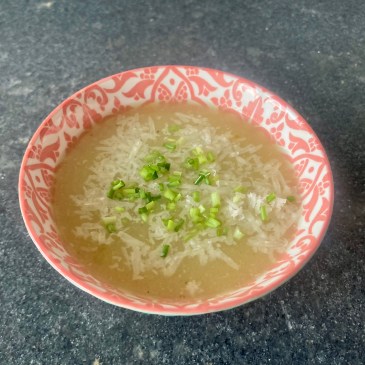 Garlic Soup ©cadwu made with garlic, potatoes, clove, bouquet garni, vegetable stock and decorated with parmesan cheese and chives