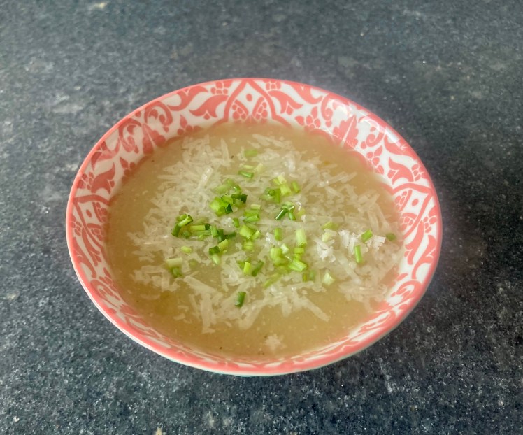 Garlic Soup ©cadwu made with garlic, potatoes, clove, bouquet garni, vegetable stock and decorated with parmesan cheese and chives