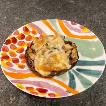 Stuffed Portobello ©cadwu with button mushrooms, oregano and taleggio