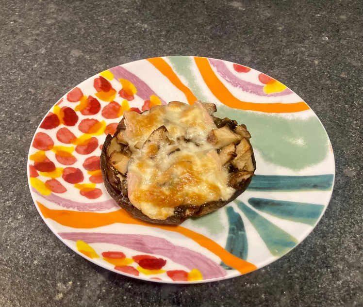 Stuffed Portobello ©cadwu with button mushrooms, oregano and taleggio