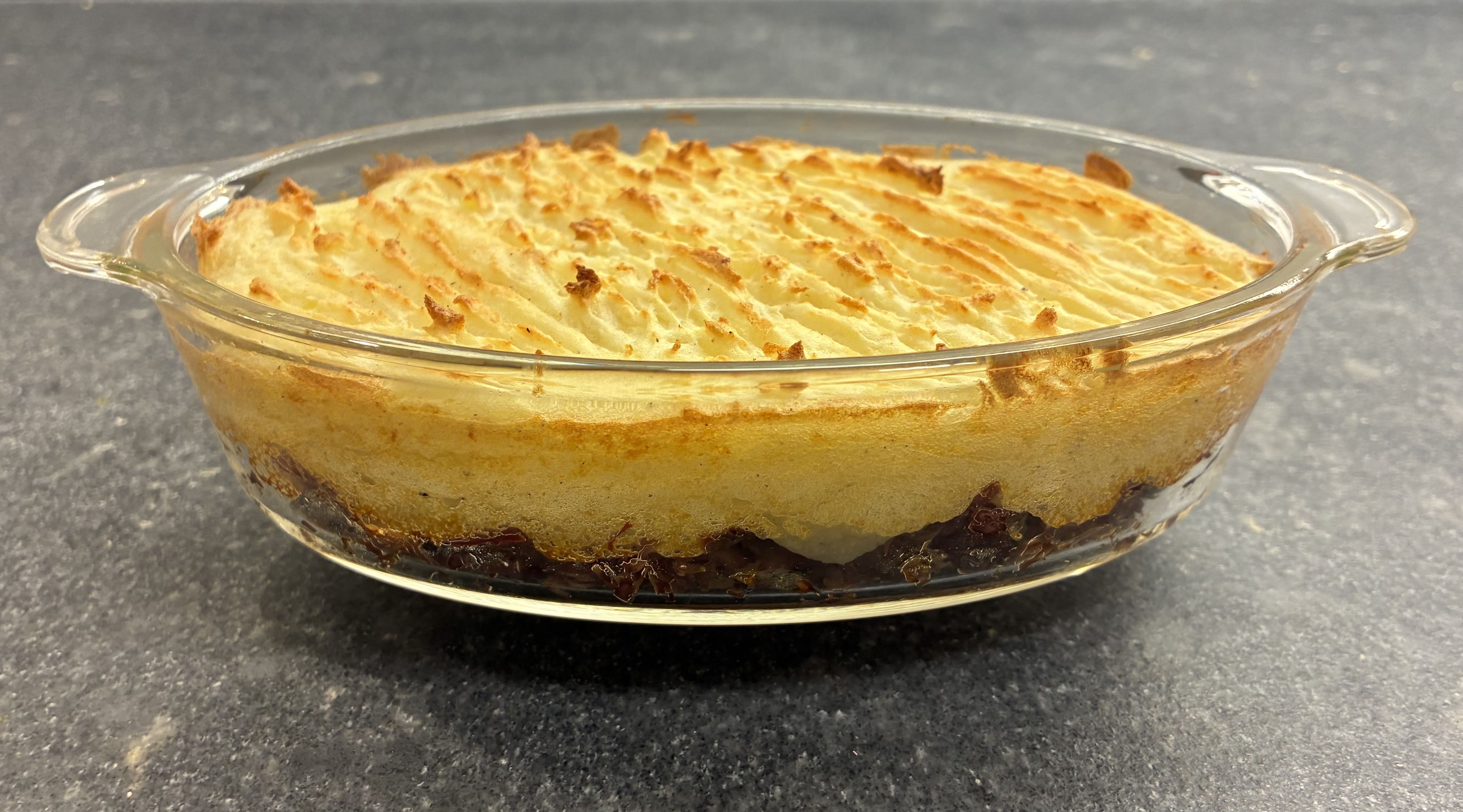 Parmentier de Canard ©cadwu made with confit de canard, shallot, garlic, rosemary and potato puree